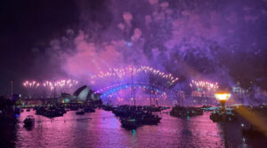 New Year's Eve fireworks over Sydney Harbour Bridge and Opera House from the Fleet Steps in the Royal Botanic Garden